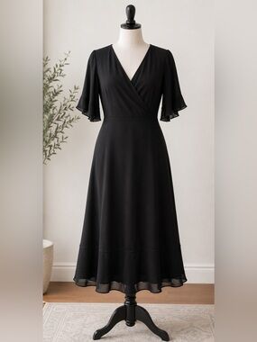 Anthropologie Isabella Bird 100% Silk Midi Dress Large
Classic Quiet Luxury
